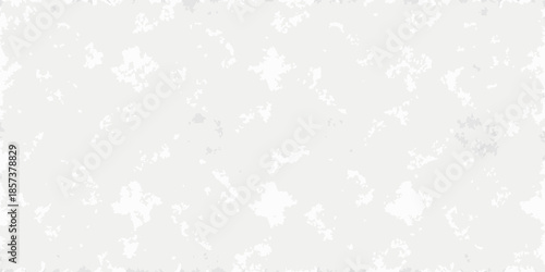 Abstract white background with scattered irregular shapes and textures