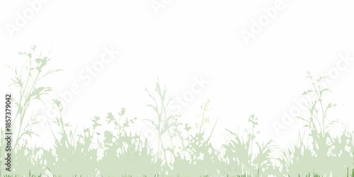 A serene landscape featuring subtle green grasses and foliage silhouettes