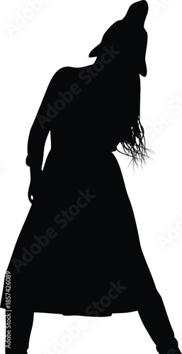 Silhouette of a woman with long hair wearing a coat, standing against a bright background with wind blowing her hair.
