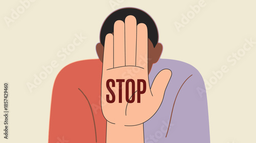 A person holding up their open palm with the word STOP clearly written on it