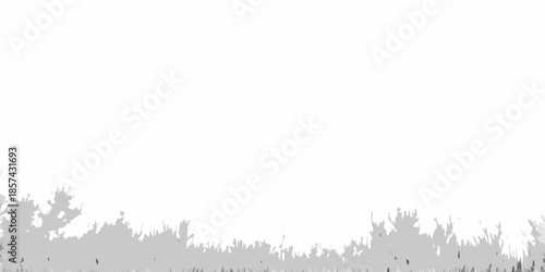 A stark neutral image featuring a blurry textured ground and distant trees