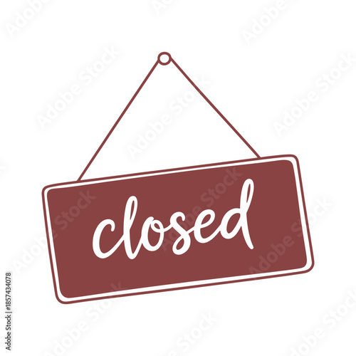 Red closed sign with white script lettering hanging by a string