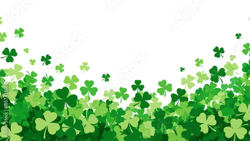 A vibrant and festive background filled with numerous green shamrocks and clover leaves, evoking a sense of St. Patrick's Day celebration.
