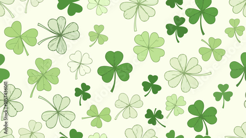 A seamless pattern of various green shamrocks and four-leaf clovers on a light background.