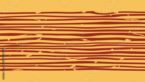 Brown Liquorice Strips on Orange Background.