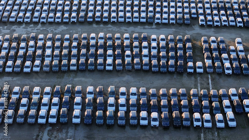 Schilderij op canvas New car inventory organized in rows, a large parking lot showing mass production