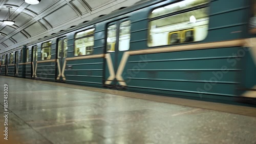 Moscow Metro Belorusskaya station platform with marble wall and signal light