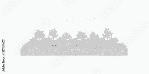 A grayscale silhouette of trees and birds in flight above them
