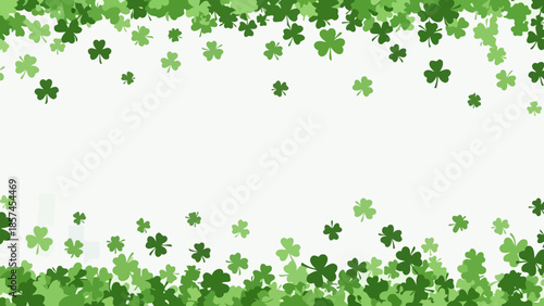 A festive background filled with numerous green shamrocks scattered across a white canvas.