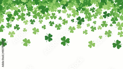 A cascade of green shamrocks falling against a white background, symbolizing luck and St. Patrick's Day.