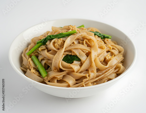 Indonesian kwetiau rebus /  Chinese guǒ tiáo/ guo tiao, soft wide flat rice noodles with moist surface and subtle broth, on a white plate with white background, suitable for food advertisement