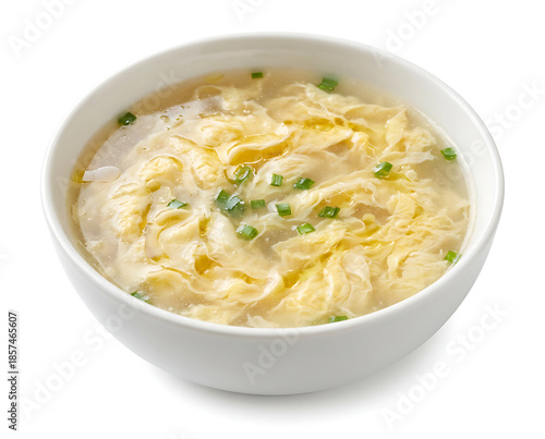 Chinese egg drop soup, silky egg ribbons in light broth with uneven swirl patterns, on a white plate with white background, suitable for food advertisement