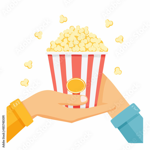 Person holding a bucket of popcorn, ready to enjoy a movie or event
