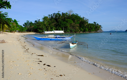 Beach and boats on Daracoton Island, Palawan, The Philippines