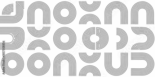 Abstract arrangement of curved lines forming letter like shapes in grayscale