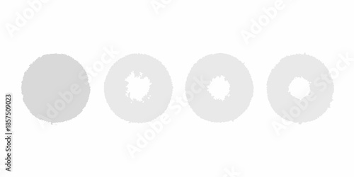 A series of four gray circular shapes displaying varying degrees of erosion