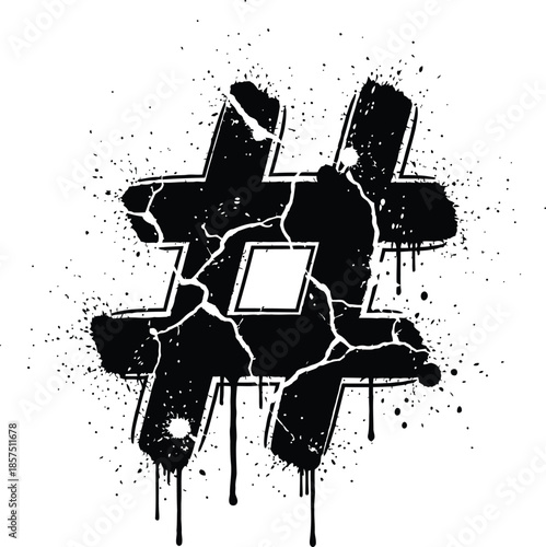 Graffiti art with black paint splatters and cracked texture