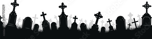 Silhouette of graveyard with Celtic crosses and tombstones