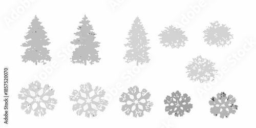 Silhouettes of evergreen trees and delicate snowflake patterns in grayscale