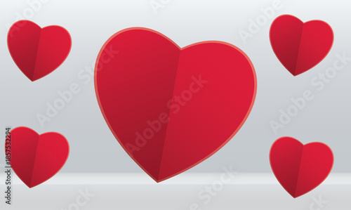 small and big red foldable heart on abstract background