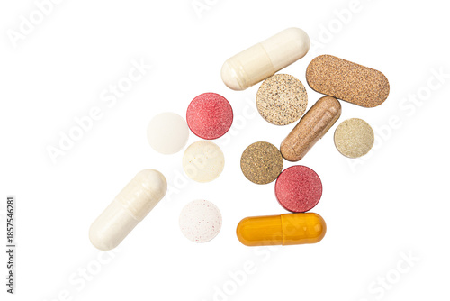 Various pills on white background