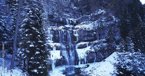 Winter landscape on the Dolomite waterfalls.