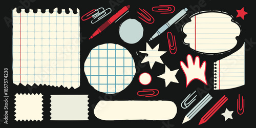 Stationery elements scattered on a black background paper pens and clips