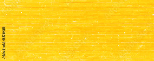 Old yellow brick wall panorama background texture