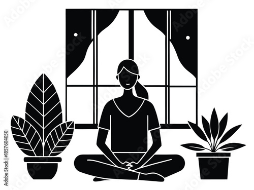 Woman practicing yoga indoors with plants