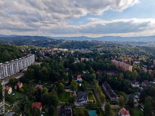 Serene Scenic View, Serene Aerial Perspective Capturing Sunlit Valley Dotted With Homes And Lush Greenery