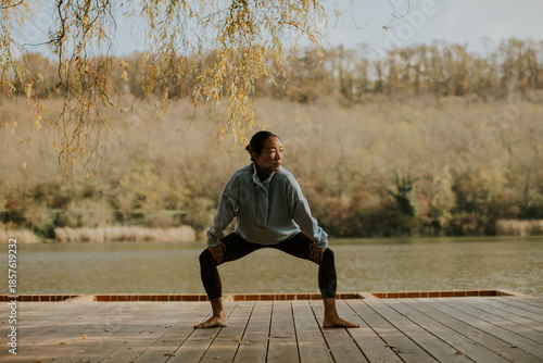 Korean woman practicing yog...