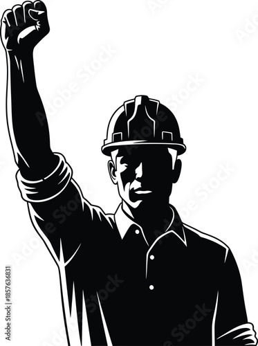A worker in a hard hat raises his fist in solidarity or protest