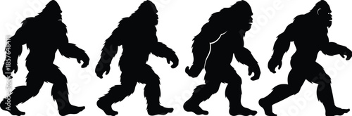 Silhouette of four sasquatch walking isolated on transparent background