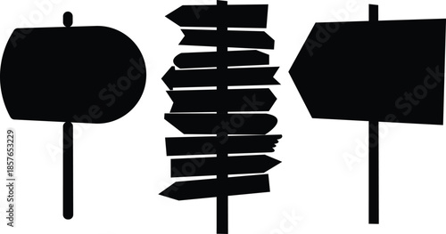 Three black silhouette signs including a round sign a multi directional arrow sign and a directional sign Keywords