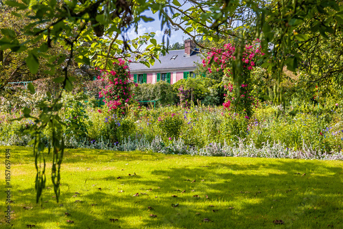 Wallpaper Mural Claude Monet's house in Giverny, France. The artist himself designed the famous gardens, which he used as subjects for his paintings. Torontodigital.ca