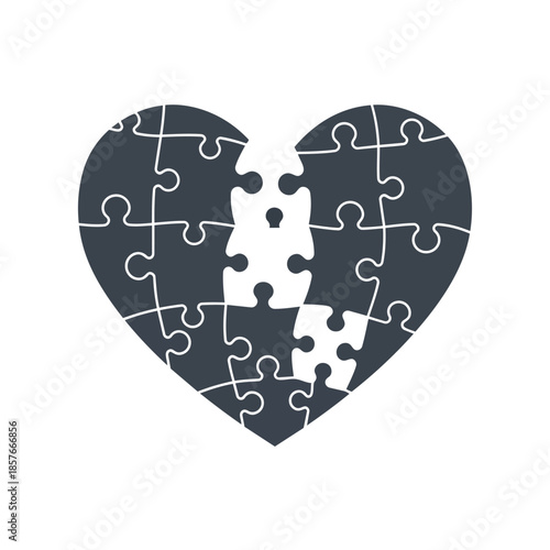 A broken heart vector illustration composed of puzzle pieces on a white background with a dark grey heart and white accents.