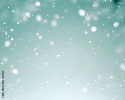 Soft falling snow on teal winter background with blurry bokeh lights and cold frosted atmosphere style