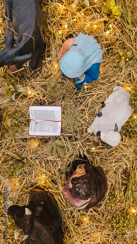 A traditional Christmas nativity scene (creche) and festive decorations 