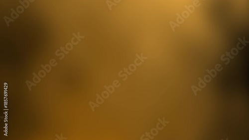 Abstract warm golden background with a smooth gradient texture creating a soothing atmosphere suitable for various design projects and artistic applications