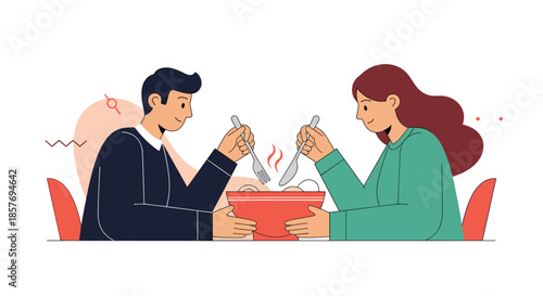 Young couple, a man and a woman, sitting opposite each other at a table and happily sharing a meal from a large red bowl.