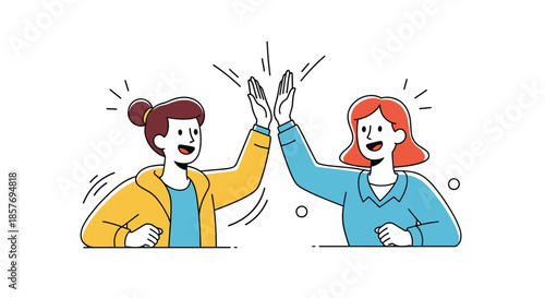 Two happy young women giving each other a high five in celebration of teamwork, success, friendship, or a shared achievement.