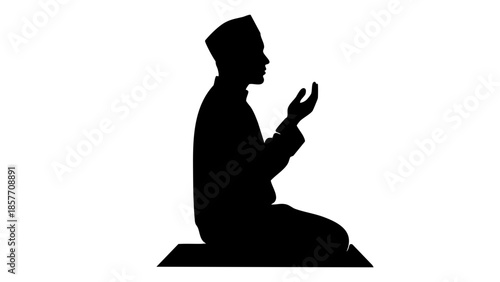 A silhouette of a Muslim man in prayer, in a moment of spiritual contemplation and devotion