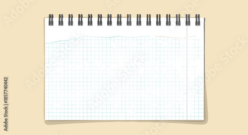 Top view of an open spiral-bound notebook with lined paper showing a slightly torn top edge resting on a soft beige background surface.
