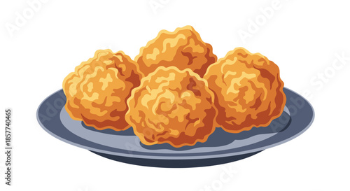 Plate of four golden-brown fried chicken nuggets or meatballs served on a dark blue ceramic dish ready for a snack or meal.
