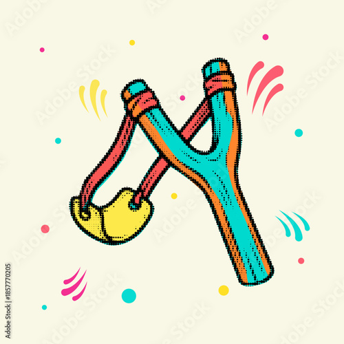 Halftone pop art dot wooden slingshot toy with elastic band ready to aim and shoot in retro style vector illustration
