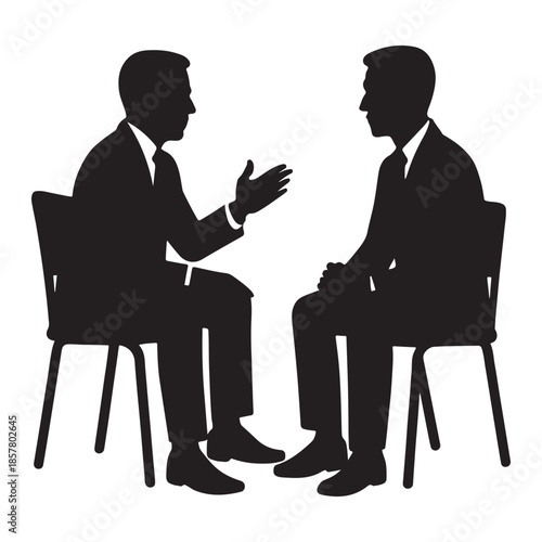 Two businessmen in silhouette discussing ideas while seated, conveying a professional conversation.