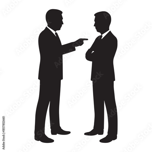 Two businessmen in silhouette having a serious discussion and pointing fingers.