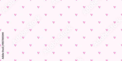Seamless watercolor pink hearts pattern on soft pastel pink background. Romantic hand painted texture perfect for Valentine’s Day, wedding designs, fabric prints and cute wallpapers.