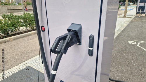 Electric vehicle charging station providing sustainable energy
