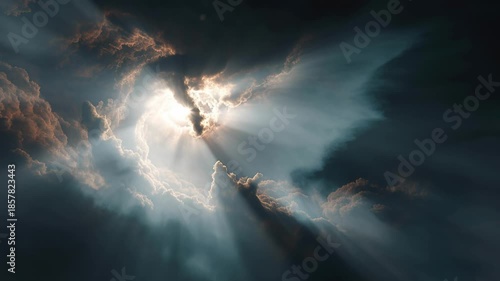 Golden sun rays piercing dark dramatic clouds heavenly light atmospheric sky nature phenomenon